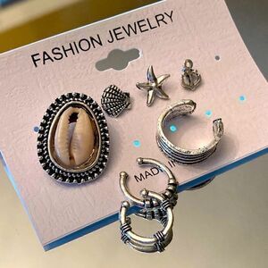 Oceans set earrings 
New comes with 3 cuffs